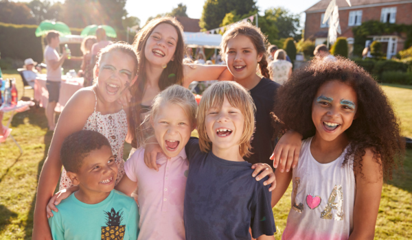 A group of happy kids at a youth program. 