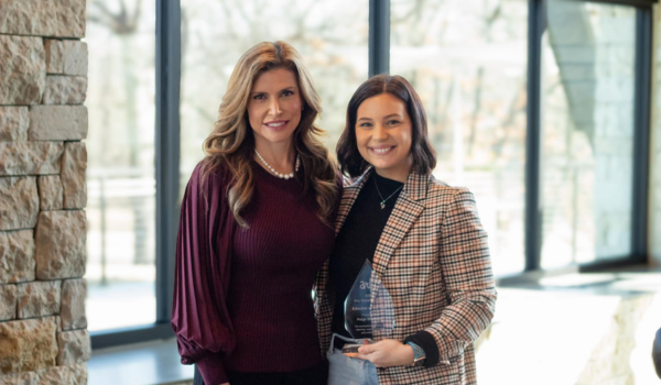 Arly CEO, Lauren Sanchez Gilbert, poses with Arly Educator of the Year recipient, Paige Westover-McElhaney. 